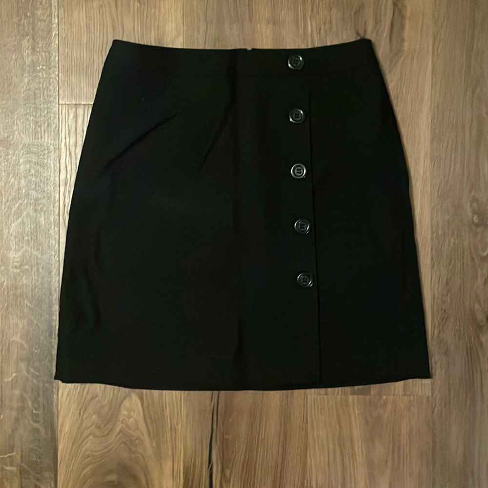 Black pencil skirt with button detail, fully lined